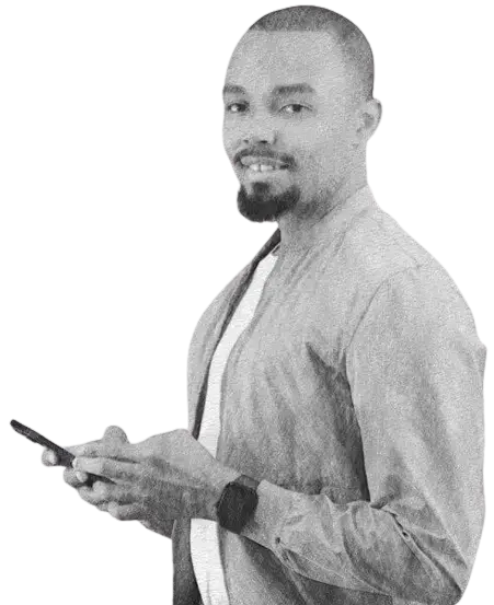 David Celestin, diplomat, creator and entrepreneur. Founder and CEO of DAVIDCELESTIN.COM. David Celestin photo DAVIDCELESTIN.COM Holding mobile phone wearing jacket and smart watch